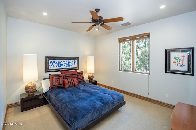 carpeted bedroom featuring a ceiling fan, recessed lighting, visible vents, and baseboards