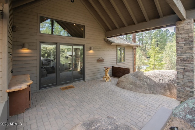 property entrance featuring a patio