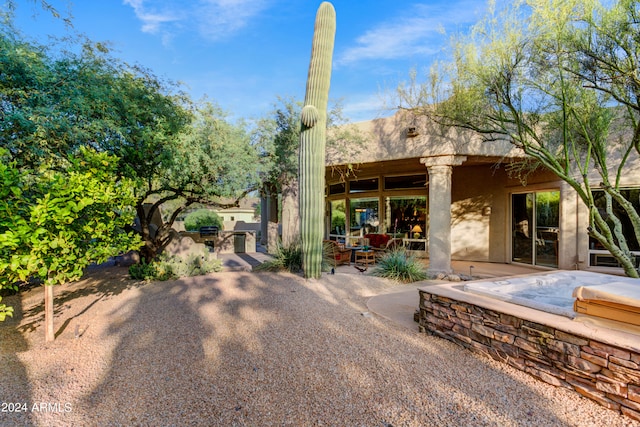 rear view of house with a patio area