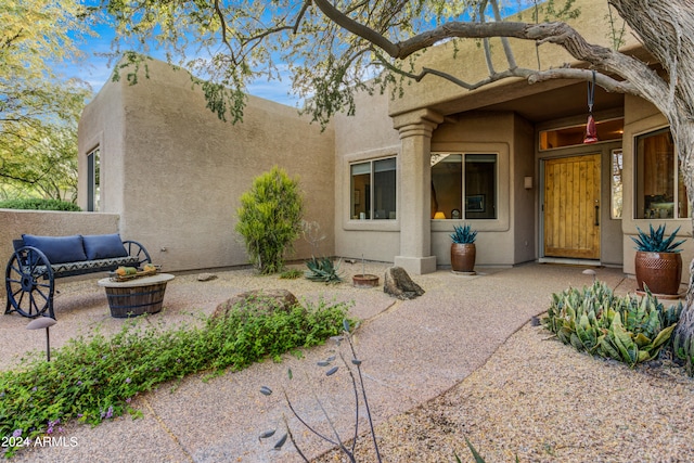 back of house featuring a patio area