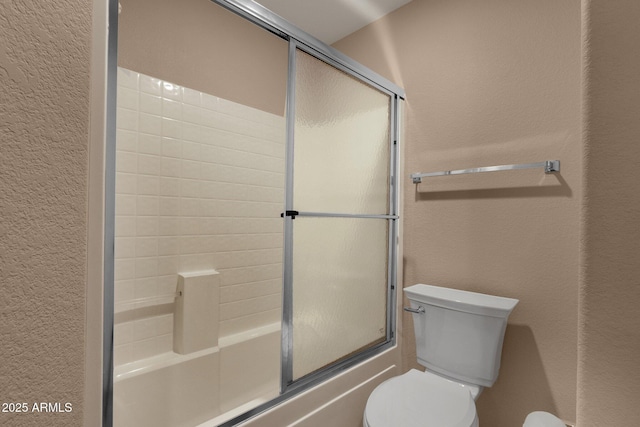 7101 W Beardsley Rd Unit 1502, Glendale, AZ 85308 - full bath with a textured wall, enclosed tub / shower combo, and toilet