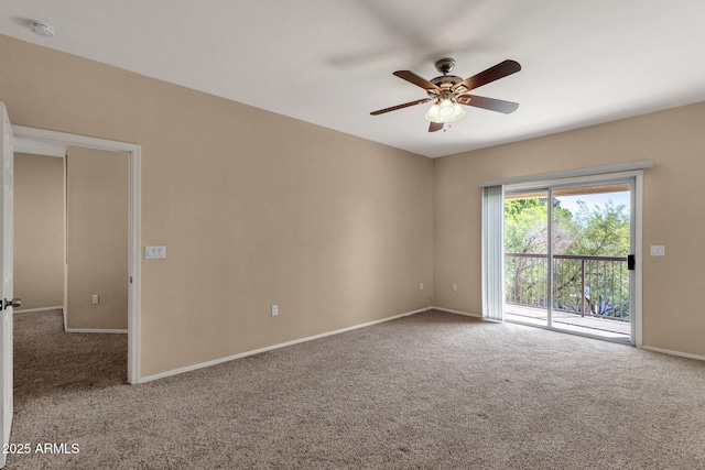 7101 W Beardsley Rd Unit 1502, Glendale, AZ 85308 - spare room featuring carpet floors, ceiling fan, a smoke detector, and baseboards