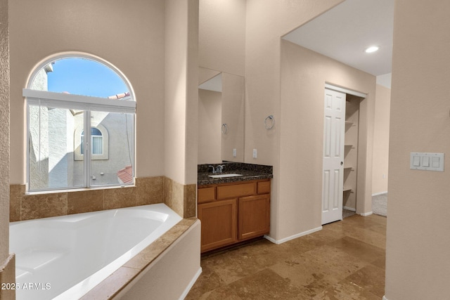 7101 W Beardsley Rd Unit 1502, Glendale, AZ 85308 - bathroom with a garden tub and vanity