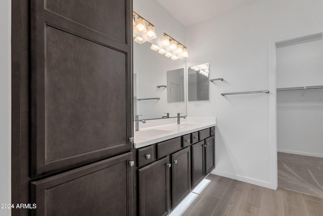 bathroom featuring vanity and hardwood / wood-style floors