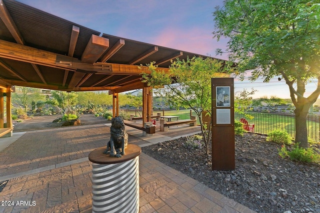 view of patio terrace at dusk