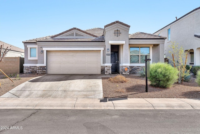 view of front of home with a garage