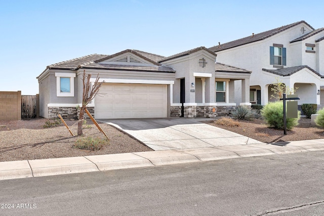 view of front of property with a garage