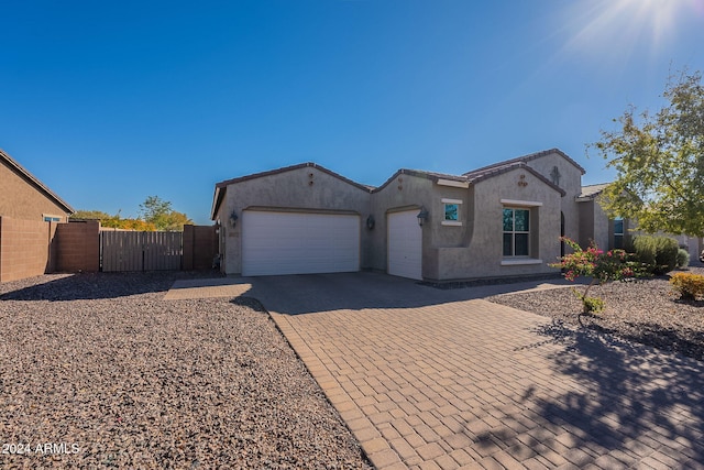 view of front of property featuring a garage