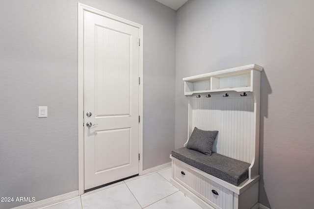 mudroom with light tile patterned floors