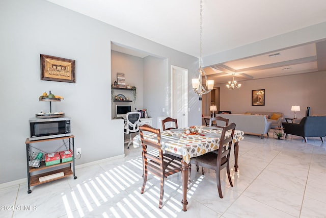 dining space featuring beam ceiling and a chandelier