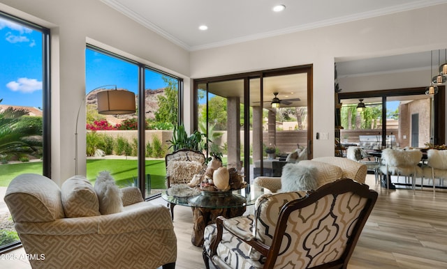 4450 E Camelback Rd Unit 4, Phoenix, AZ 85018 - sunroom featuring recessed lighting, ornamental molding, and wood finished floors