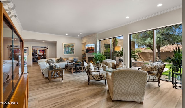 4450 E Camelback Rd Unit 4, Phoenix, AZ 85018 - living area featuring crown molding, light wood-style floors, and recessed lighting