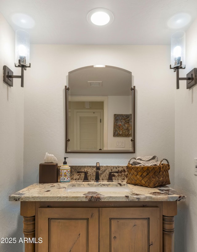 4450 E Camelback Rd Unit 4, Phoenix, AZ 85018 - bathroom featuring vanity and visible vents