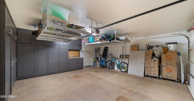 4450 E Camelback Rd Unit 4, Phoenix, AZ 85018 - garage with a garage door opener