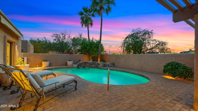 4450 E Camelback Rd Unit 4, Phoenix, AZ 85018 - view of swimming pool with a fenced in pool, a fenced backyard, and a patio area