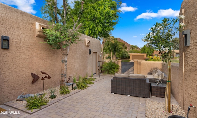4450 E Camelback Rd Unit 4, Phoenix, AZ 85018 - view of patio featuring outdoor lounge area