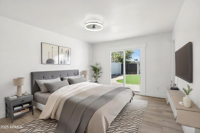 1653 E Palmcroft Dr, Tempe, AZ 85282 - bedroom with access to outside, light wood finished floors, and baseboards