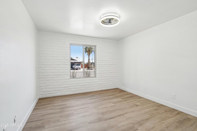 1653 E Palmcroft Dr, Tempe, AZ 85282 - empty room with wood finished floors and baseboards