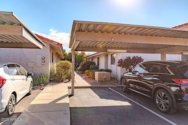 view of car parking with a carport