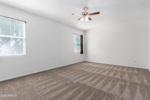 28259 N Chalcocite St, San Tan Valley, AZ 85143 - carpeted spare room with ceiling fan and baseboards
