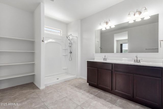 28259 N Chalcocite St, San Tan Valley, AZ 85143 - bathroom with double vanity, a shower, plenty of natural light, and tile patterned floors