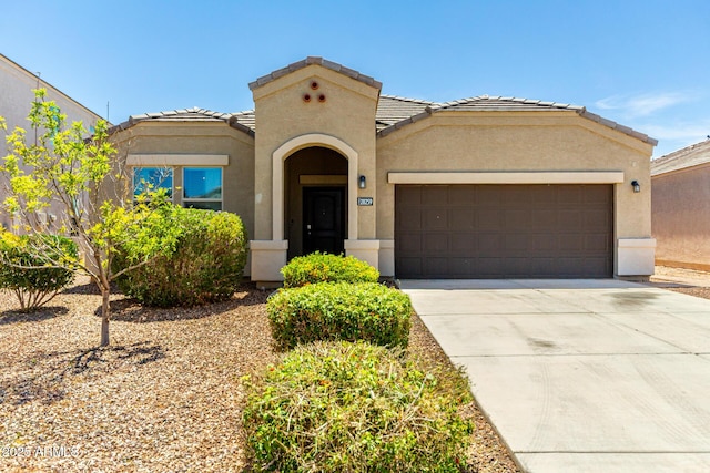28259 N Chalcocite St, San Tan Valley, AZ 85143 - mediterranean / spanish house with stucco siding, a garage, driveway, and a tile roof