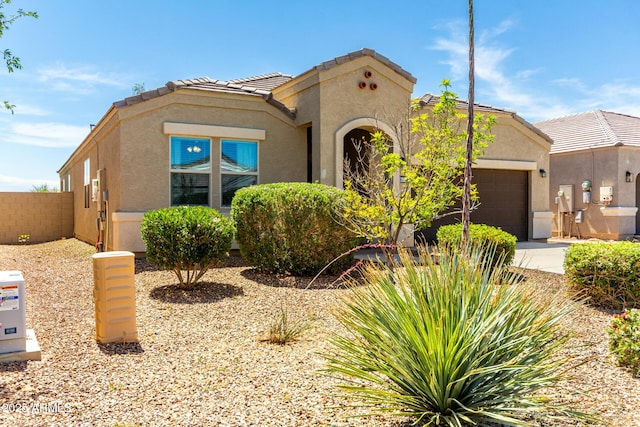 28259 N Chalcocite St, San Tan Valley, AZ 85143 - mediterranean / spanish-style house featuring stucco siding, a garage, concrete driveway, and a tiled roof