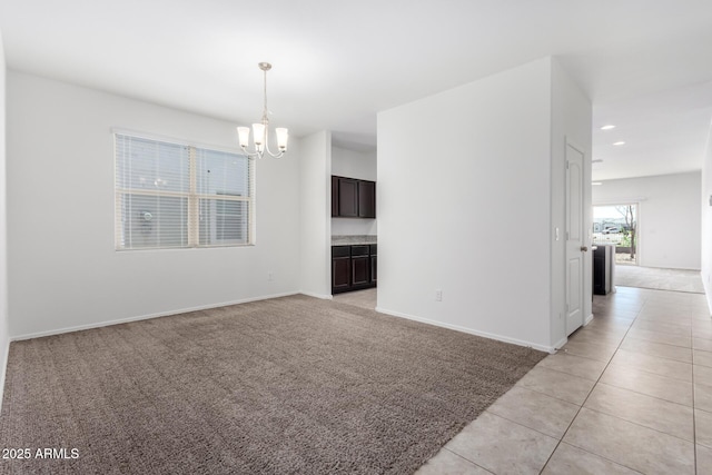 28259 N Chalcocite St, San Tan Valley, AZ 85143 - unfurnished room featuring light colored carpet, a chandelier, recessed lighting, and light tile patterned floors