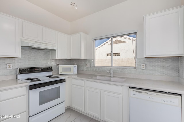 kitchen featuring white appliances, sink, decorative backsplash, white cabinets, and extractor fan