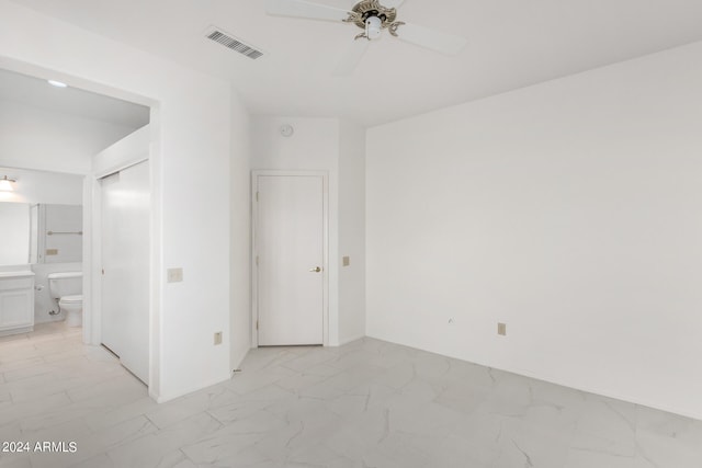 interior space featuring ceiling fan