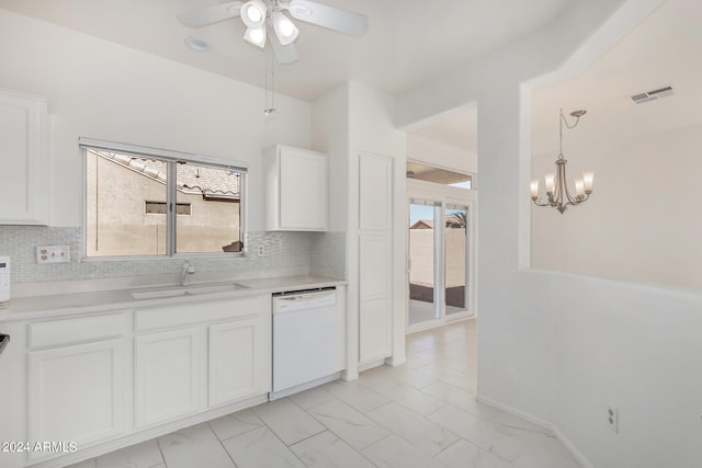 kitchen featuring white cabinetry, backsplash, dishwasher, and sink