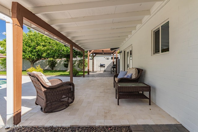 view of patio with a fenced backyard and an outdoor pool
