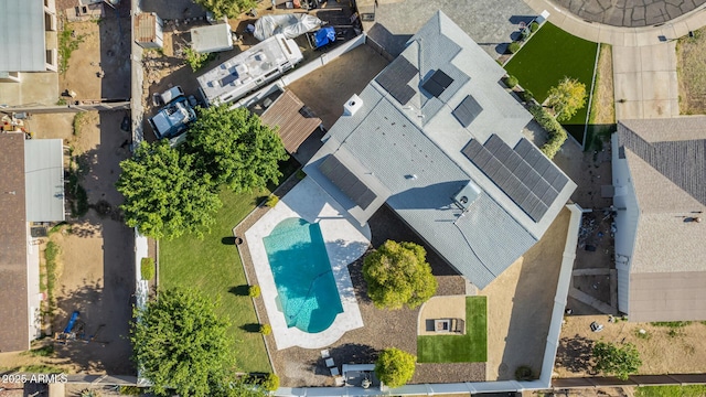 birds eye view of property with a residential view