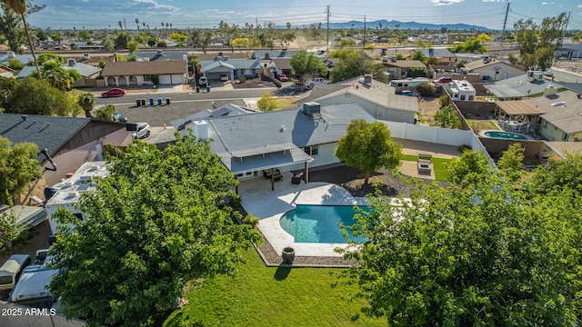 bird's eye view featuring a mountain view and a residential view
