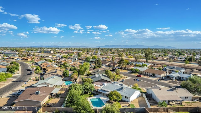 drone / aerial view with a residential view and a mountain view