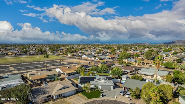 drone / aerial view with a residential view and a mountain view