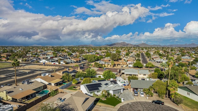 drone / aerial view with a residential view and a mountain view
