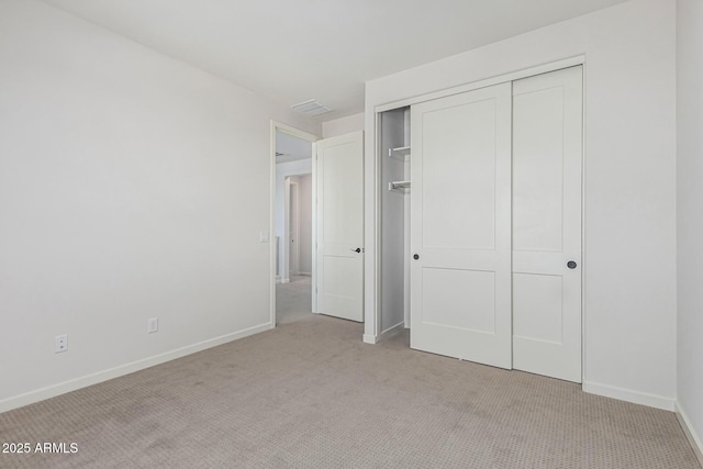 17322 W Puget Ave, Waddell, AZ 85355 - unfurnished bedroom with carpet flooring and a closet