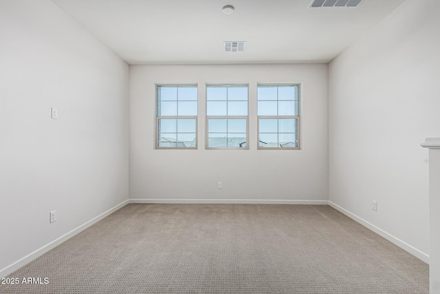 17322 W Puget Ave, Waddell, AZ 85355 - unfurnished room featuring plenty of natural light and carpet flooring
