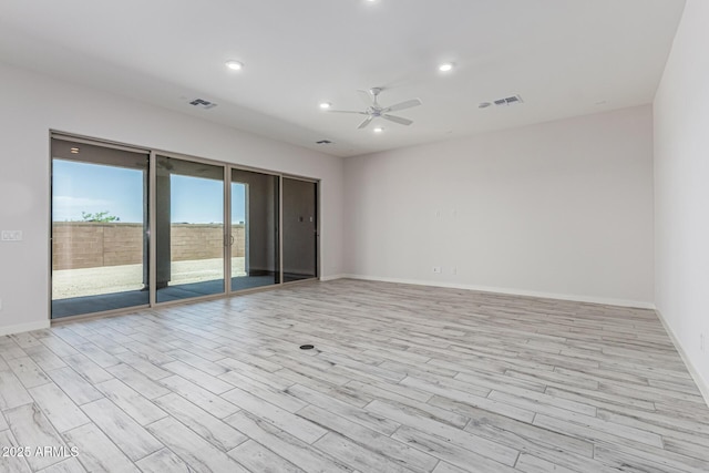 17322 W Puget Ave, Waddell, AZ 85355 - unfurnished room featuring ceiling fan, light wood finished floors, and recessed lighting
