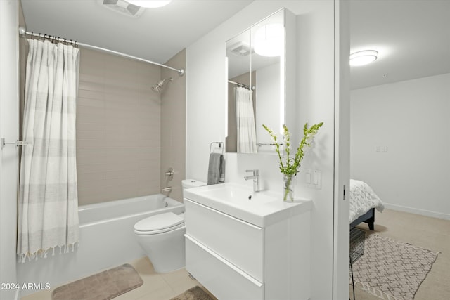 full bathroom with shower / bathtub combination with curtain, vanity, tile patterned flooring, and toilet