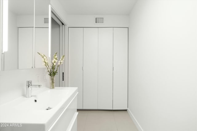 bathroom with tile patterned flooring