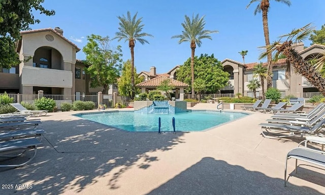 view of pool featuring a patio