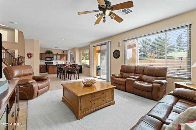 living room with ceiling fan