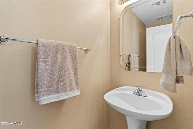 bathroom featuring sink