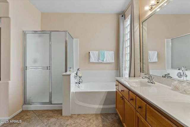 bathroom featuring vanity, shower with separate bathtub, and tile patterned flooring