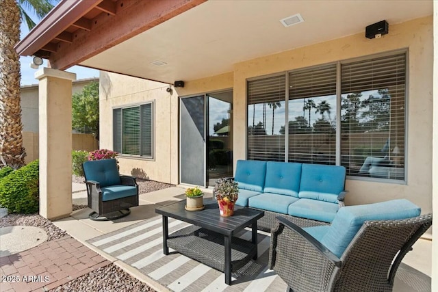 view of patio featuring an outdoor hangout area