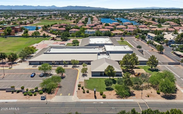 birds eye view of property featuring a mountain view