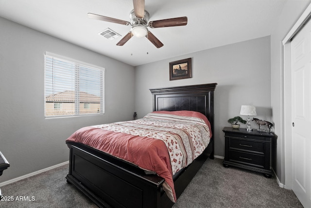 bedroom with a ceiling fan, carpet flooring, visible vents, and baseboards