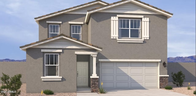traditional-style home featuring a mountain view, an attached garage, a tile roof, stucco siding, and driveway
